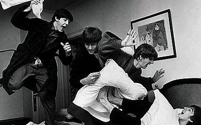 The Beatles -- from left, Paul McCartney, John Lennon, Ringo Starr and George Harrison -- letting off steam with a pillow fight. (photo credit: Harry Benson/JTA)