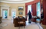 US President Barack Obama talks on the phone in the Oval Office, July 25, 2014. (photo credit: Pete Souza/ White House)