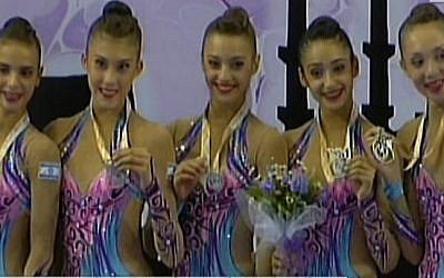 Members of Israel's rhythmic gymnastics teems show off their silver medals, Sunday, September 28, 2014 (screen capture: Channel 2)