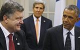 US President Barack Obama is seated with Ukraine President Petro Poroshenko as they meet with other countries regarding Ukraine at the NATO summit at Celtic Manor in Newport, Wales, Thursday, September 4, 2014. At rear center is US Secretary of State John Kerry. (photo credit: AP Photo/Charles Dharapak)