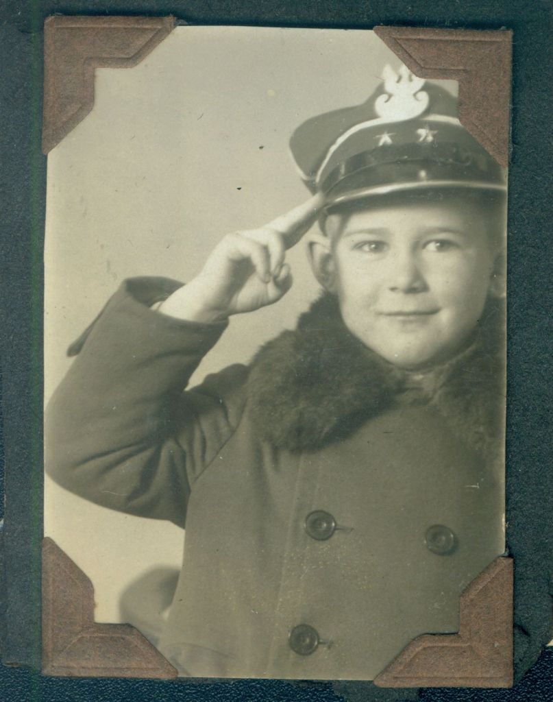 Andrew Andrew Borowiec as a little boy, giving the two-fingered Polish salute (courtesy)