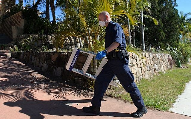A police officer searches a house in Mount Gravatt, Brisbane, Australia, Thursday, Sept. 18, 2014. (Photo credit: AP/AAP Image, Dave Hunt) A police officer searches a house in Mount Gravatt, Brisbane, Australia, Thursday, Sept. 18, 2014. (Photo credit: AP/AAP Image, Dave Hunt)