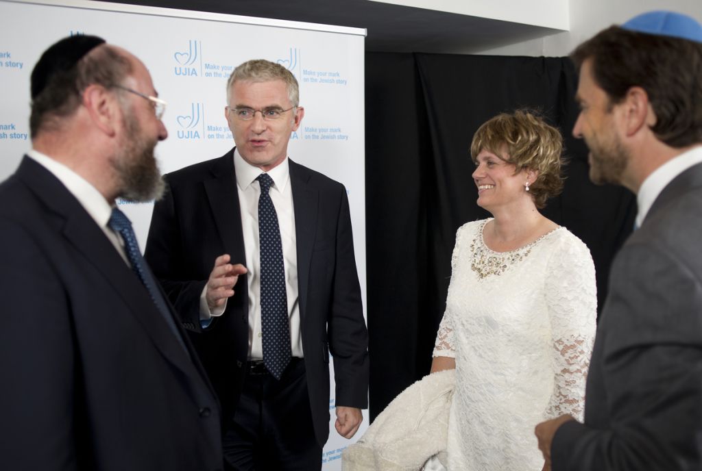 Chief Rabbi Ephraim Mirvis in conversation with HE Ambassador Daniel Taub, Zehava Taub and Bill Benjamin at the annual UJIA dinner, September 15, 2014. (Blake Ezra Photography)