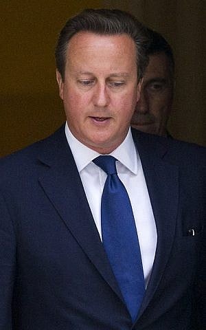 British Prime Minister David Cameron leaves 10 Downing Street in central London on 3, September 2014, after chairing an emergency meeting following the execution of a second US journalist by Islamist fighters in Iraq and the threat that a British hostage will be next. (photo credit: AFP PHOTO / JUSTIN TALLIS)
