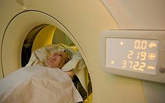 A woman with breast cancer undergoing a CT scan, June 18, 2012. (photo credit: Chen Leopold/Flash90)