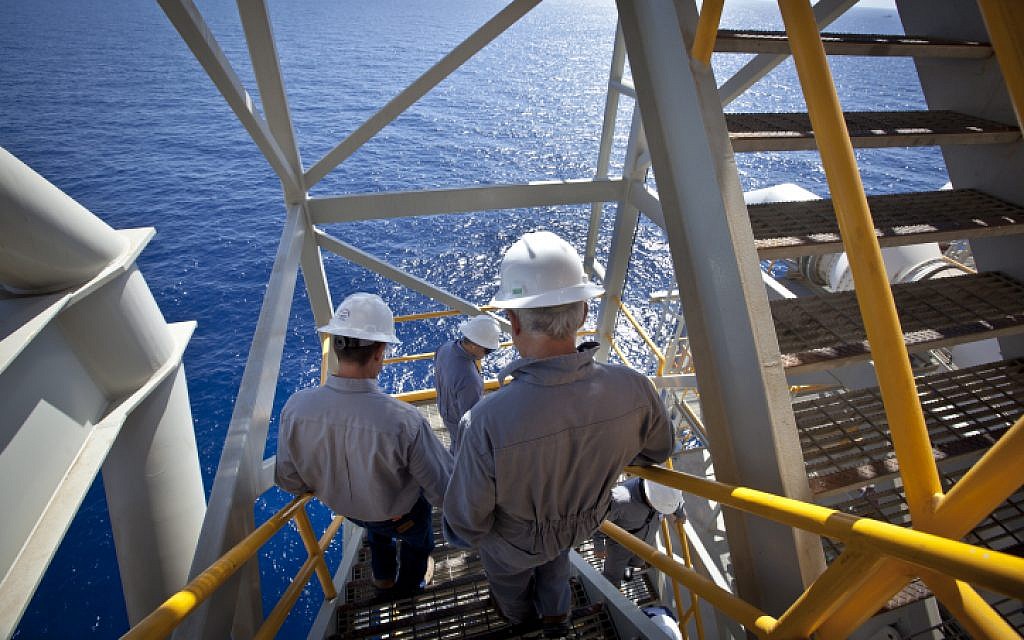 Workers on the Israeli 'Tamar' gas processing rig, 24 km off the Israeli southern coast of Ashkelon. (Moshe Shai/FLASH90)