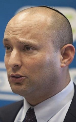 Economics and Trade Minister Naftali Bennett, leader of the Jewish Home party, seen in the Israeli parliament on June 09, 2014. (photo credit: FLASH90)