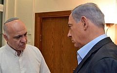 Prime Minister Benjamin Netanyahu (right) and then Shin Bet chief Yoram Cohen at IDF Headquarters in Tel Aviv, July 2014. (Haim Zach/Flash90/File)