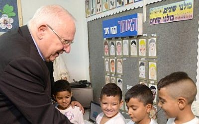 President Reuven Rivlin visits the Agricultural Elementary School, Itzhak Sade, in Dimona, to kick off the new school year on September 1, 2014. (photo credit: Mark Neyman/GPO/Flash90)