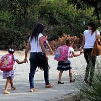 First-grade students seen on their way to class on the first day of school at the Ben Gurion Elementary School in Rehavia, Jerusalem, on September 1, 2014 (photo credit: Yossi Zamir/Flash90) First-grade students seen on their way to class on the first day of school at the Ben Gurion Elementary School in Rehavia, Jerusalem, on September 1, 2014 (photo credit: Yossi Zamir/Flash90)