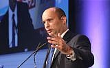 Then-economy minister Naftali Bennett speaks at an economic conference, on September 2, 2014. (photo credit: Flash90)