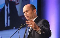 Then-economy minister Naftali Bennett speaks at an economic conference, on September 2, 2014. (photo credit: Flash90)