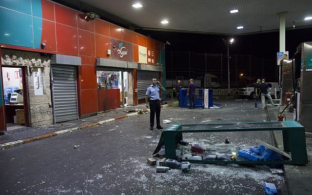 The damaged Jerusalem gas station after being attacked by rioters on September 7, 2014. (photo credit: Yonatan Sindel/Flash90) The damaged Jerusalem gas station after being attacked by rioters on September 7, 2014. (photo credit: Yonatan Sindel/Flash90)