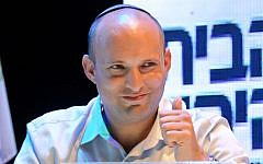 Head of the Jewish Home party, Naftali Bennett, smiles during a party conference on September 10, 2014. (photo credit: Flash90)