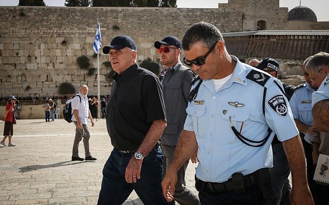 Public Security Minister Yitzhak Aharonovitch (left) and former Jerusalem District Police Chief Yossi Pariente visit the Western Wall, in Jerusalem's Old City, prior to the Jewish New Year, September 24, 2014 (photo credit: Flash90) Public Security Minister Yitzhak Aharonovitch (left) and former Jerusalem District Police Chief Yossi Pariente visit the Western Wall, in Jerusalem's Old City, prior to the Jewish New Year, September 24, 2014 (photo credit: Flash90)
