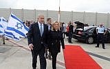 Prime Minister Benjamin Netanyahu and his wife, Sara Netanyahu, seen at the Ben Gurion Airport, Tel Aviv, as they depart for the United States on Sunday, September 28, 2014. (photo credit: Avi Ohayon/GPO/Flash90)
