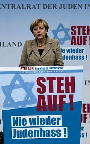 German Chancellor Angela Merkel delivers her speech at a rally against anti-Semitism near the Brandenburg Gate in Berlin, Sunday, Sept. 14, 2014.  (photo credit: AP/Markus Schreiber) 