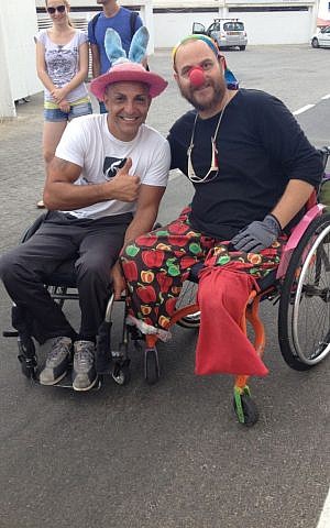 Gabriel Cordell (left) and Amir Bartura clown around during last section of the Roll for Peace in Tel Aviv. (photo credit: Renee Ghert-Zand)
