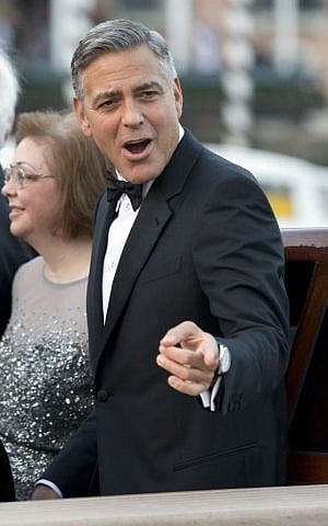 George Clooney arrives at the Aman hotel to marry Amal Alamuddin, in Venice, Italy, Saturday, Sept. 27, 2014. (photo credit: AP Photo/Andrew Medichini) George Clooney arrives at the Aman hotel to marry Amal Alamuddin, in Venice, Italy, Saturday, Sept. 27, 2014. (photo credit: AP Photo/Andrew Medichini)