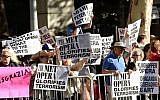 Protestors attend the arrivals at Metropolitan Opera 2014-15 Season Opening on Monday, Sept. 22, 2014, in New York. The crowd was protesting the Met's decision to premiere a controversial opera 'Death of Klinghoffer,' about the hijacking of the Italian cruise ship Achille Lauro and the murder of Jewish passenger Leon Klinghoffer. (Photo by Evan Agostini/Invision/AP)