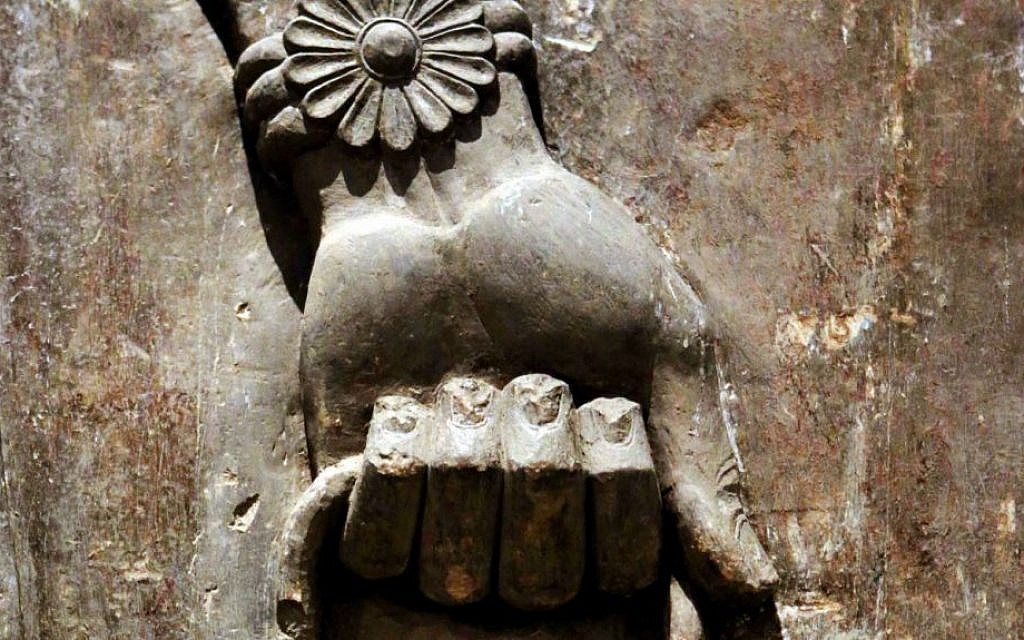 This Monday, Sept. 15, 2014 photo shows the detail of a hand, part of a statue displayed at the Iraqi National Museum in Baghdad. (AP Photo/Hadi Mizban)