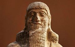 This Monday, Sept. 15, 2014 photo shows a stone statue displayed at the Iraqi National Museum in Baghdad. (AP Photo/Hadi Mizban)