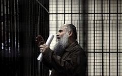 In this Sunday, September 7, 2014 file photo, radical al-Qaeda-linked preacher Abu Qatada speaks to the press prior to his verdict at the Jordanian military court in Amman, Jordan. (photo credit: AP/Mohammad Hannon, File).
