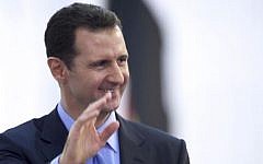Syria's President Bashar Assad (photo credit: AP Photo/SANA, File)