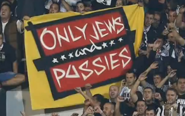 Illustrative: Fans hold up an anti-Semitic banner during a Europa League soccer match in Belgrade between UK club Tottenham and Belgrade's Partizan, Thursday September 18, 2014. (screen capture: YouTube/Danger News, illustrative) Illustrative: Fans hold up an anti-Semitic banner during a Europa League soccer match in Belgrade between UK club Tottenham and Belgrade's Partizan, Thursday September 18, 2014. (screen capture: YouTube/Danger News, illustrative)