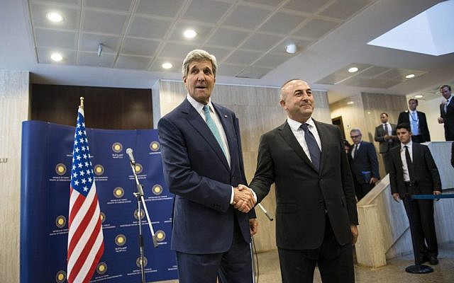 US Secretary of State John Kerry, left, shakes hand with Turkey's foreign minister Mevlut Cavusoglu upon his arrival at the Ministry of Foreign Affairs in Ankara, Turkey, on Friday, September 12, 2014. (AP Photo/Brendan Smialowski, Pool) US Secretary of State John Kerry, left, shakes hand with Turkey's foreign minister Mevlut Cavusoglu upon his arrival at the Ministry of Foreign Affairs in Ankara, Turkey, on Friday, September 12, 2014. (AP Photo/Brendan Smialowski, Pool)