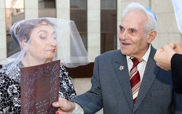 Liliya Menasheva Sadovski and Kim Boruchovitch were among 19 couples wed in Jewish ceremonies in Dnepropetrovsk’s Menora Center, Sept. 14, 2014. (Courtesy of the Jewish Community of Dnepropetrovsk) Liliya Menasheva Sadovski and Kim Boruchovitch were among 19 couples wed in Jewish ceremonies in Dnepropetrovsk’s Menora Center, Sept. 14, 2014. (Courtesy of the Jewish Community of Dnepropetrovsk)