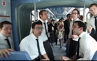 The Maccabeats sing on Jerusalem's light rail in their new video, 'Home.' (YouTube screenshot)