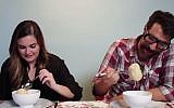 Taste testers cautiously approach matzo ball soup. (YouTube screenshot)