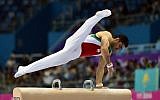 Saeed Raza Keikha of Iran competes in the artistic gymnastics men's pommel horse individual qualifications and team final at Namdong Gymnasium during the 2014 Asian Games in Incheon on September 21, 2014. (photo credit: AFP PHOTO / Prakash SINGH)