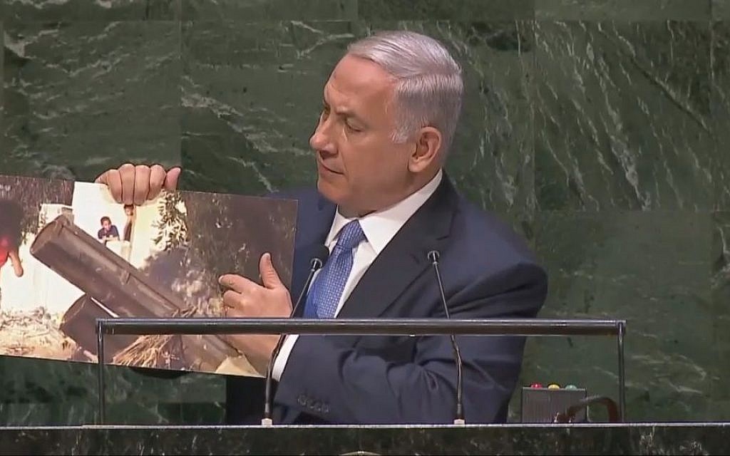 Prime Minister Benjamin Netanyahu shows photo of Hamas rocket launcher during speech to UN General Assembly (screen capture: UN, YouTube)