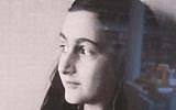 Photograph taken in the Anne Frank House book shop with her image and translated copies of the diary in the background. (Matt Lebovic/The Times of Israel)