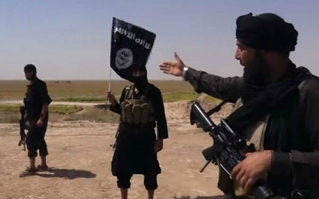 Islamic State fighters near the border between Syria and Iraq (screen capture: YouTube/Vice News)