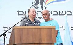 Defense Minister Moshe Ya'alon (L) at a memorial event for fallen Druze soldiers, September 12, 2014 (photo credit: Ofer Idelbici)