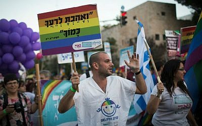 Marching along a main street in Jerusalem during the annual Gay Pride parade, on September 18, 2014. (photo credit: Hadas Parush/Flash90)