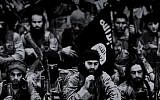 Still from the video 'Flames of War,' which was released on Friday, September 19, 2014, presumably by members of the Islamic State. (screen capture: YouTube)