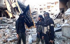 Illustrative photo of fighters from the al-Qaeda-linked Nusra Front near Damascus, Syria, on September 22, 2014. (AFP/Rami al-Sayed)