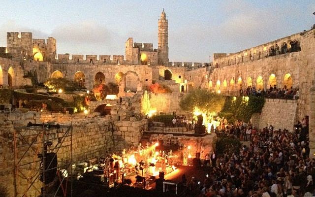 Morning breaking over the ancient walls of Jerusalem's Tower of David Museum, as Ehud Banai performed at the Sacred Music Festival (photo credit: Jessica Steinberg/Times of Israel) Morning breaking over the ancient walls of Jerusalem's Tower of David Museum, as Ehud Banai performed at the Sacred Music Festival (photo credit: Jessica Steinberg/Times of Israel)