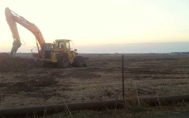 A tractor on Tuesday morning at the first site where Afek hopes to begin drilling. A temporary injunction stopped work at the site on Monday night (Courtesy photo: Adam Teva VDin) A tractor on Tuesday morning at the first site where Afek hopes to begin drilling. A temporary injunction stopped work at the site on Monday night (Courtesy photo: Adam Teva VDin)