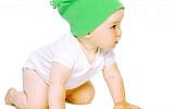Among other things,  'winter babies' may be wearing less clothing in the summer,  when they are getting ready to crawl. (photo credit: Baby image)