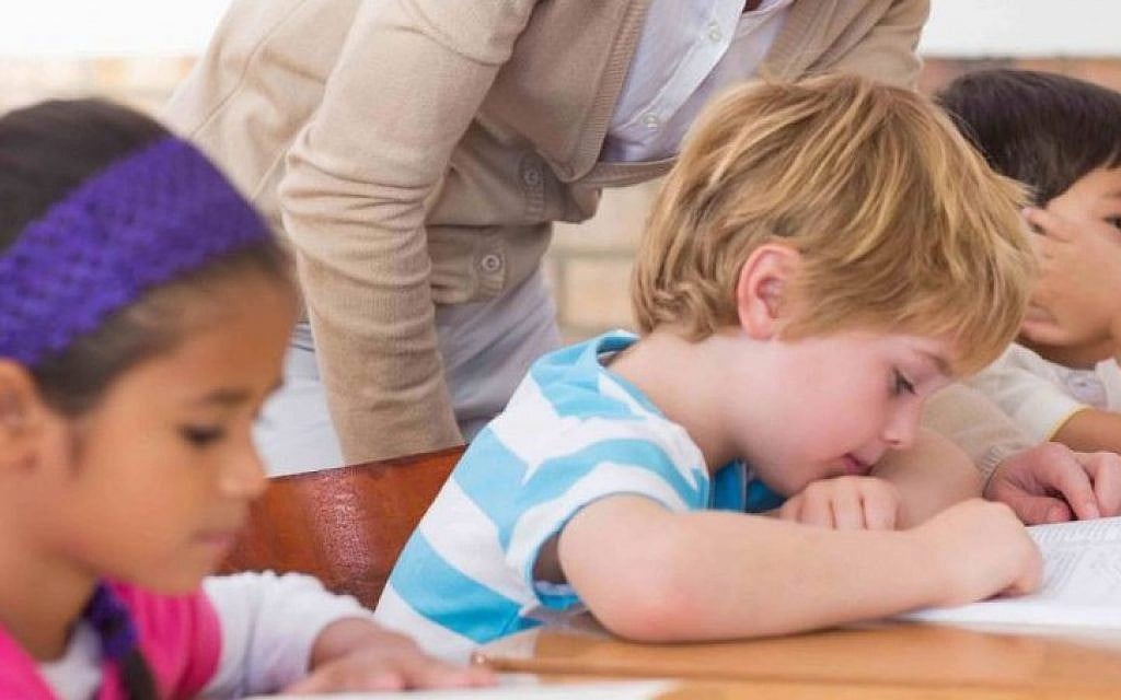 Illustrative photo of schoolchildren taking an exam. (Shutterstock)