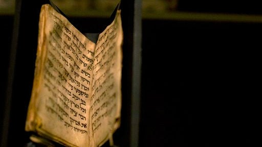 An ancient prayer book is seen on display at the Bible Lands museum in Jerusalem, Thursday, Sept. 18, 2014 (photo credit: AP/Sebastian Scheiner) An ancient prayer book is seen on display at the Bible Lands museum in Jerusalem, Thursday, Sept. 18, 2014 (photo credit: AP/Sebastian Scheiner)