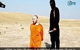Steven Sotloff next to his Islamic State captor, 'Jihadi John,' in a video released September 2, 2014. (Screen capture: SITE/Twitter)