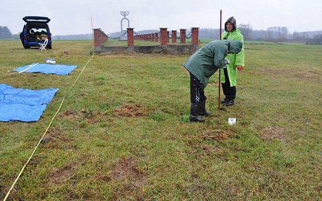 Researchers searching for human remains in Wasosz, the site of a massacre of Jewish villagers in 1941. (photo credit: Podlaska Archaeological Laboratory)