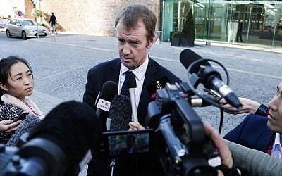 Michael Mann, spokesman of European Union High Representative for Foreign Affairs and Security Policy and Vice-President of the European Commission talks to the media outside the Palais Coburg as part of the socalled EU 5+1 Talks with Iran in Vienna, Austria on October 14, 2014.  (photo credit: AFP/PATRICK DOMINGO) 
