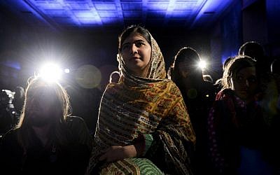 Pakistani activist for female education and Nobel Peace Prize laureate Malala Yousafzai sits before receiving the 2014 World's Children Prize for the Rights of the Child during an award ceremony at Gripsholm Castle in Stockholm on October 29, 2014.
